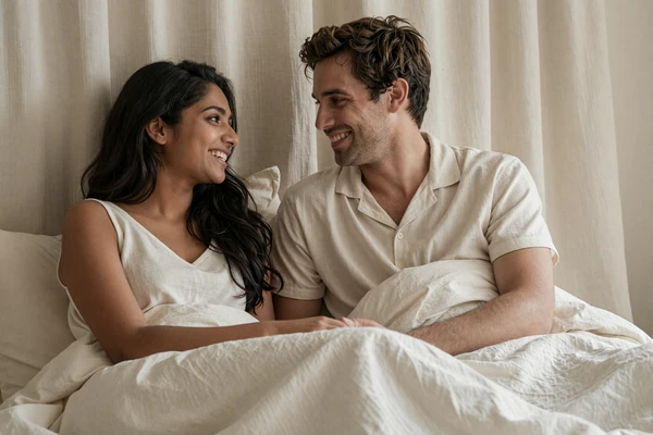 Tender couple sharing intimacy beyond size, body-positive sex-positive dating